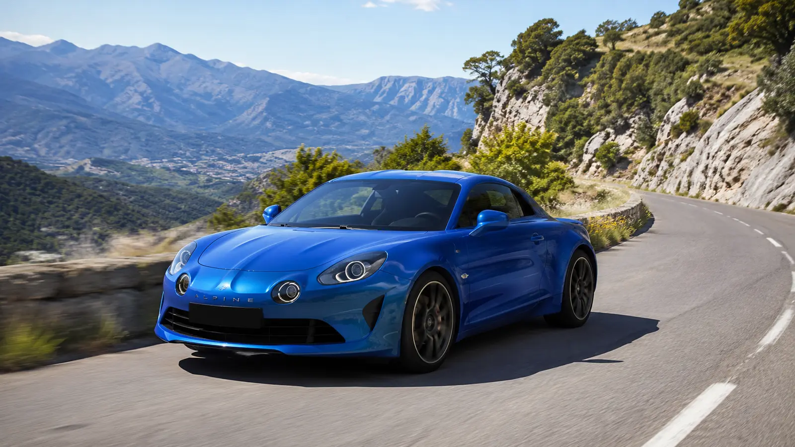 АВТО 1000230 синий Alpine A110 S на горной дороге