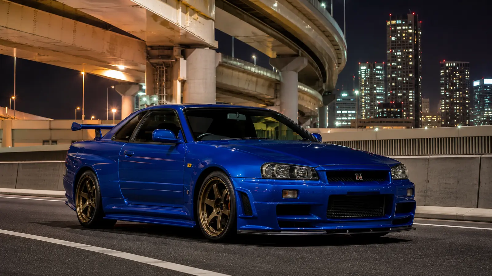 АВТО 1000425 синий Nissan Skyline GT R R34 в городе