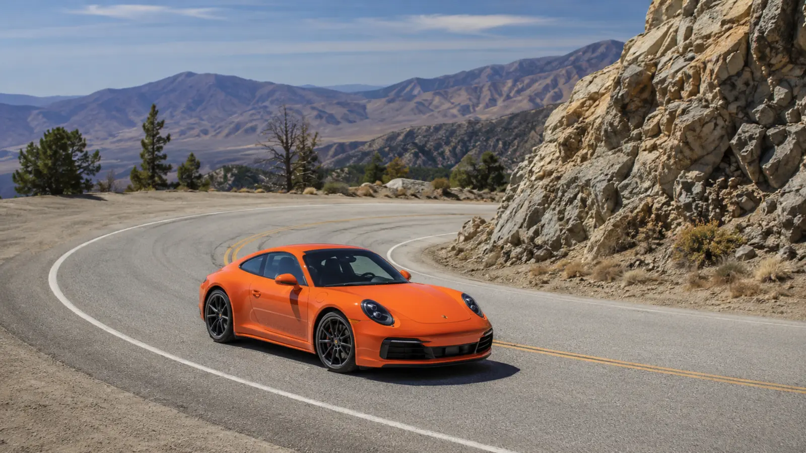 АВТО 1000099 оранжевый Porsche 911 на серпантине