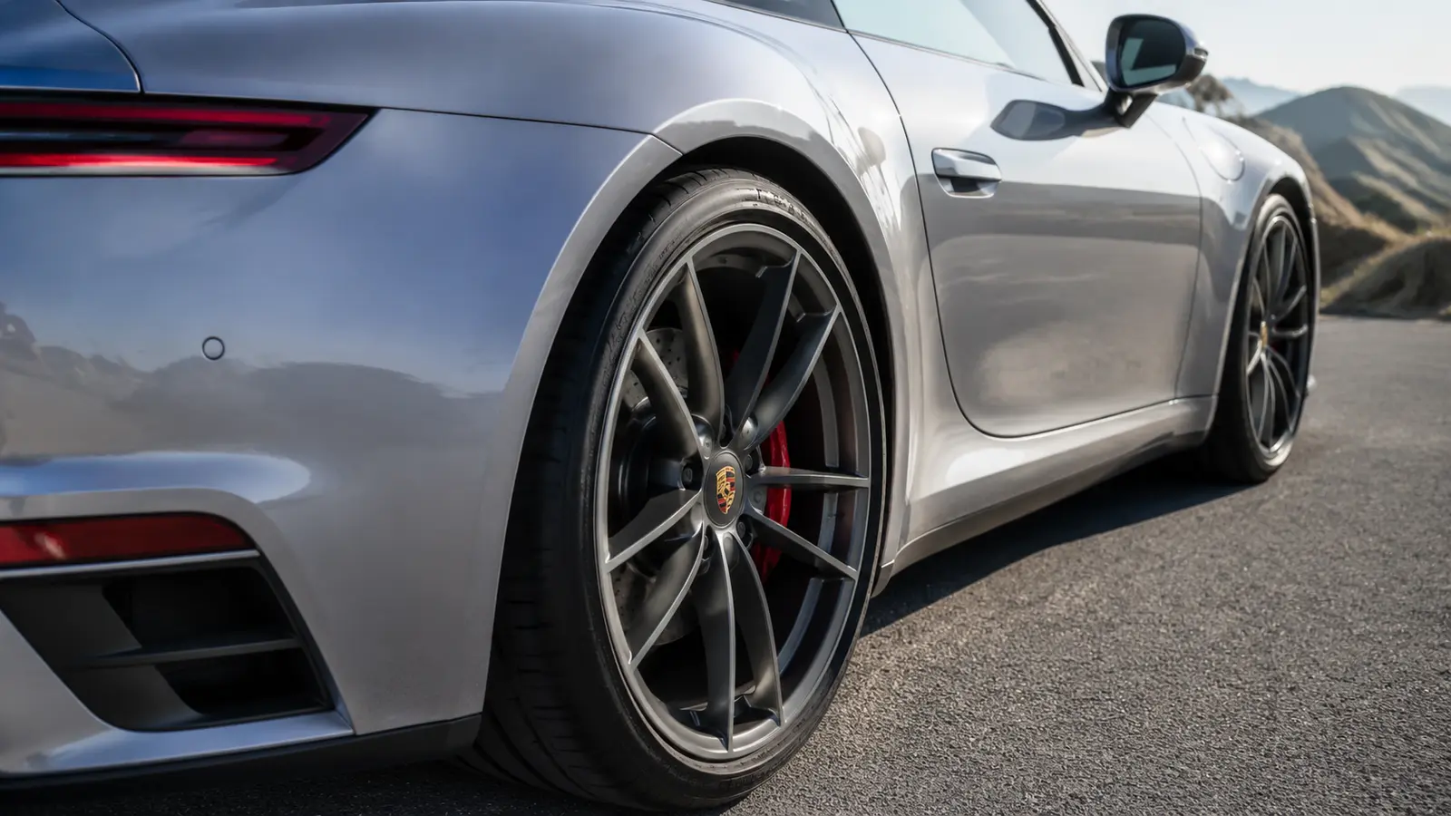 АВТО 1000668 крупный план колеса и кузова Porsche 911
